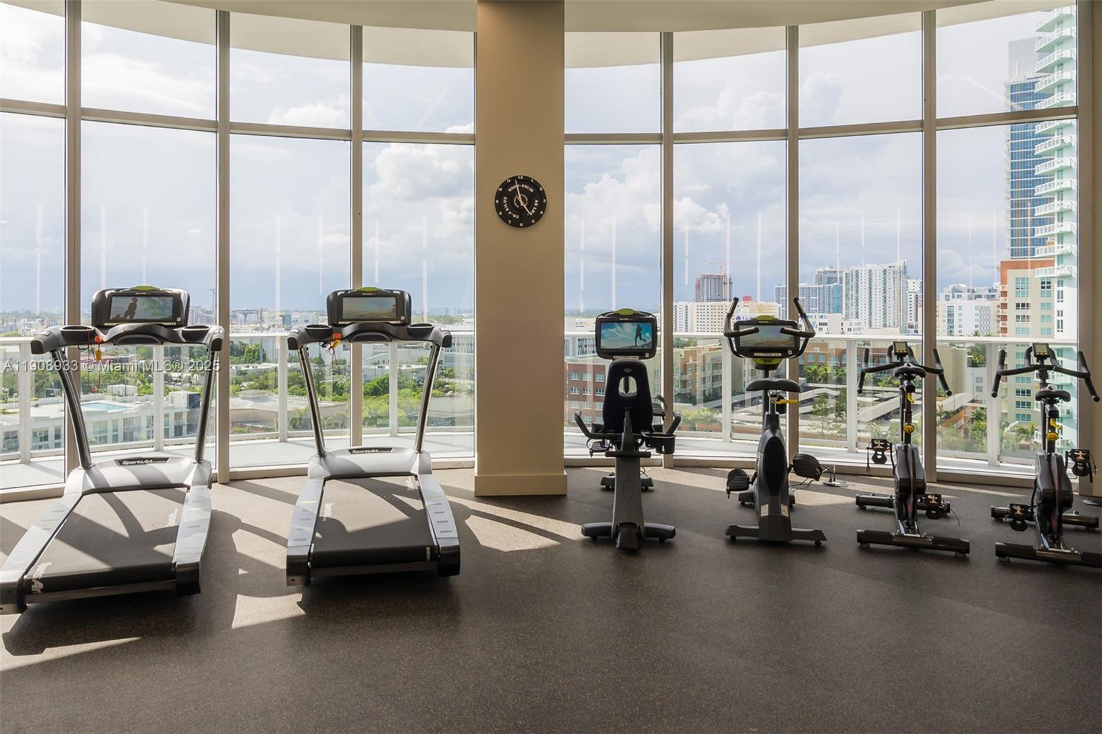 488 Northeast 18th Street, Unit 2701 Miami, FL 33132 - Photo 64 of 70 a view of a room with gym equipment