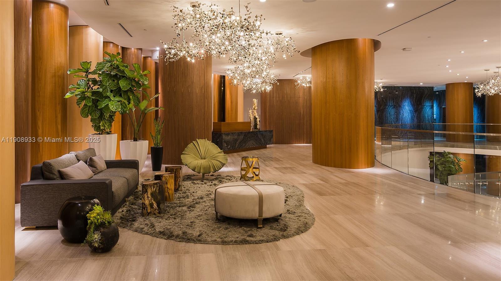 488 Northeast 18th Street, Unit 2701 Miami, FL 33132 - Photo 68 of 70 a living room with furniture and a chandelier