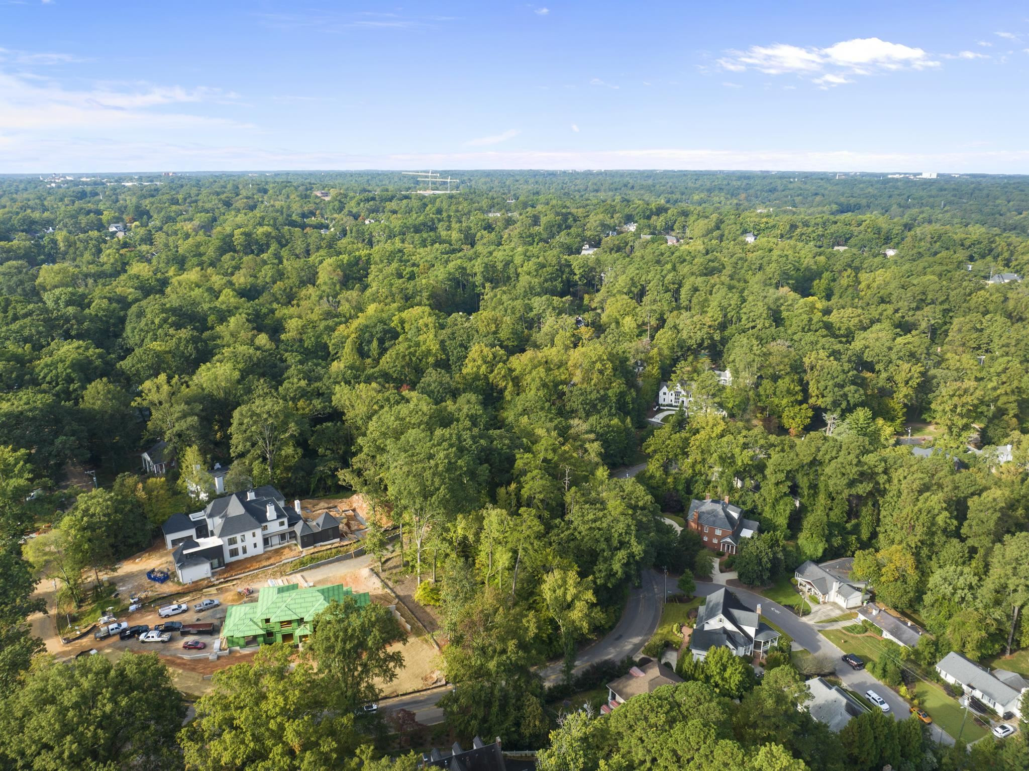 2949 White Oak Road Raleigh, NC 27609 - Photo 12 of 15 a view of a city with lush green forest