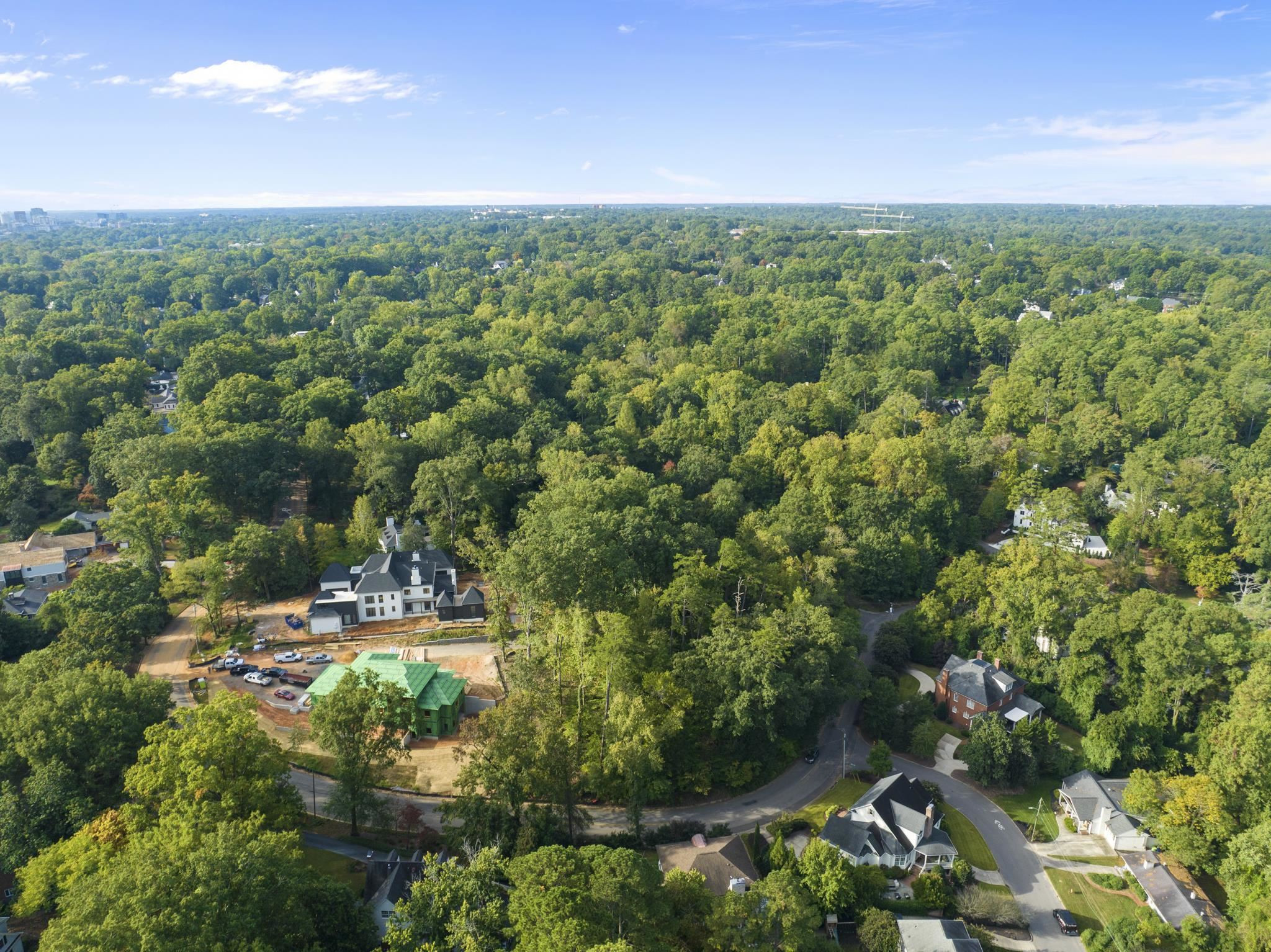 2949 White Oak Road Raleigh, NC 27609 - Photo 13 of 15 a view of a city with lush green forest