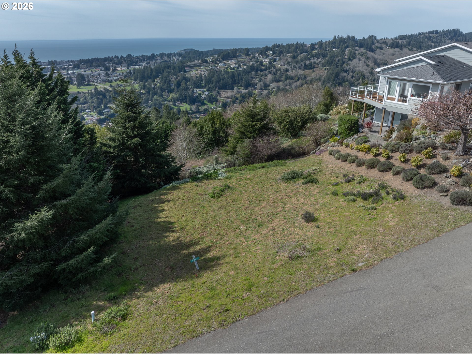 98010 Crown Terrace, Unit 1 Brookings, OR 97415 - Photo 5 of 10 an aerial view of a house