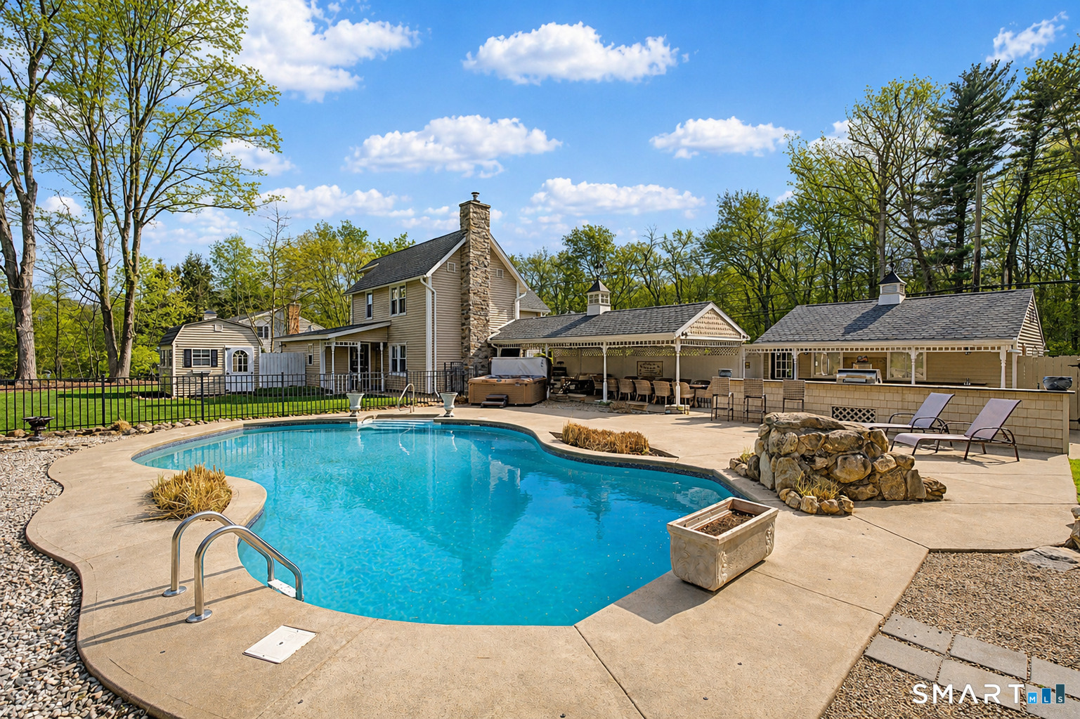602 Durham Road Madison, CT 06443 - Photo 2 of 34 In ground pool with patio