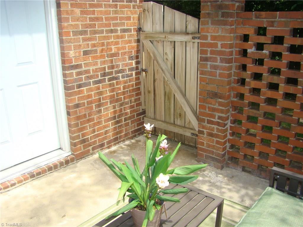 228 Northpoint Avenue, Unit A High Point, NC 27262 - Photo 3 of 11 Patio enclosure and storage room door