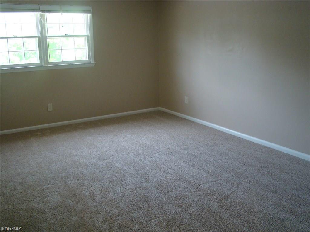 228 Northpoint Avenue, Unit A High Point, NC 27262 - Photo 9 of 11 Upstairs master bedroom with new carpet