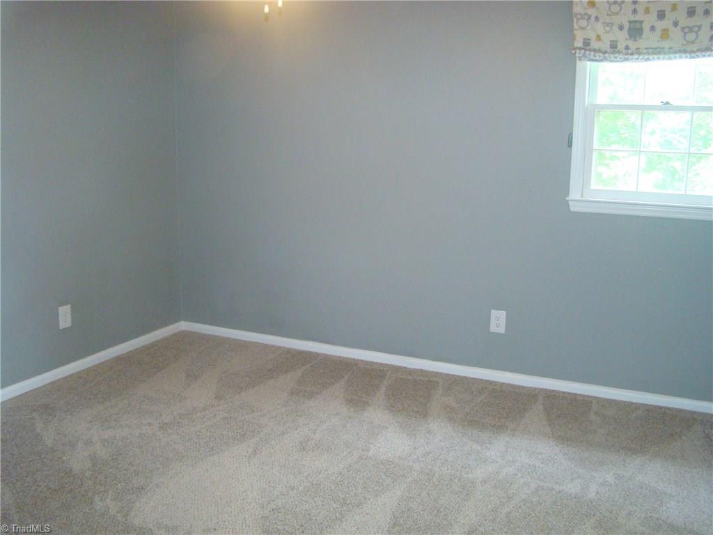 228 Northpoint Avenue, Unit A High Point, NC 27262 - Photo 10 of 11 Second bedroom with new carpet