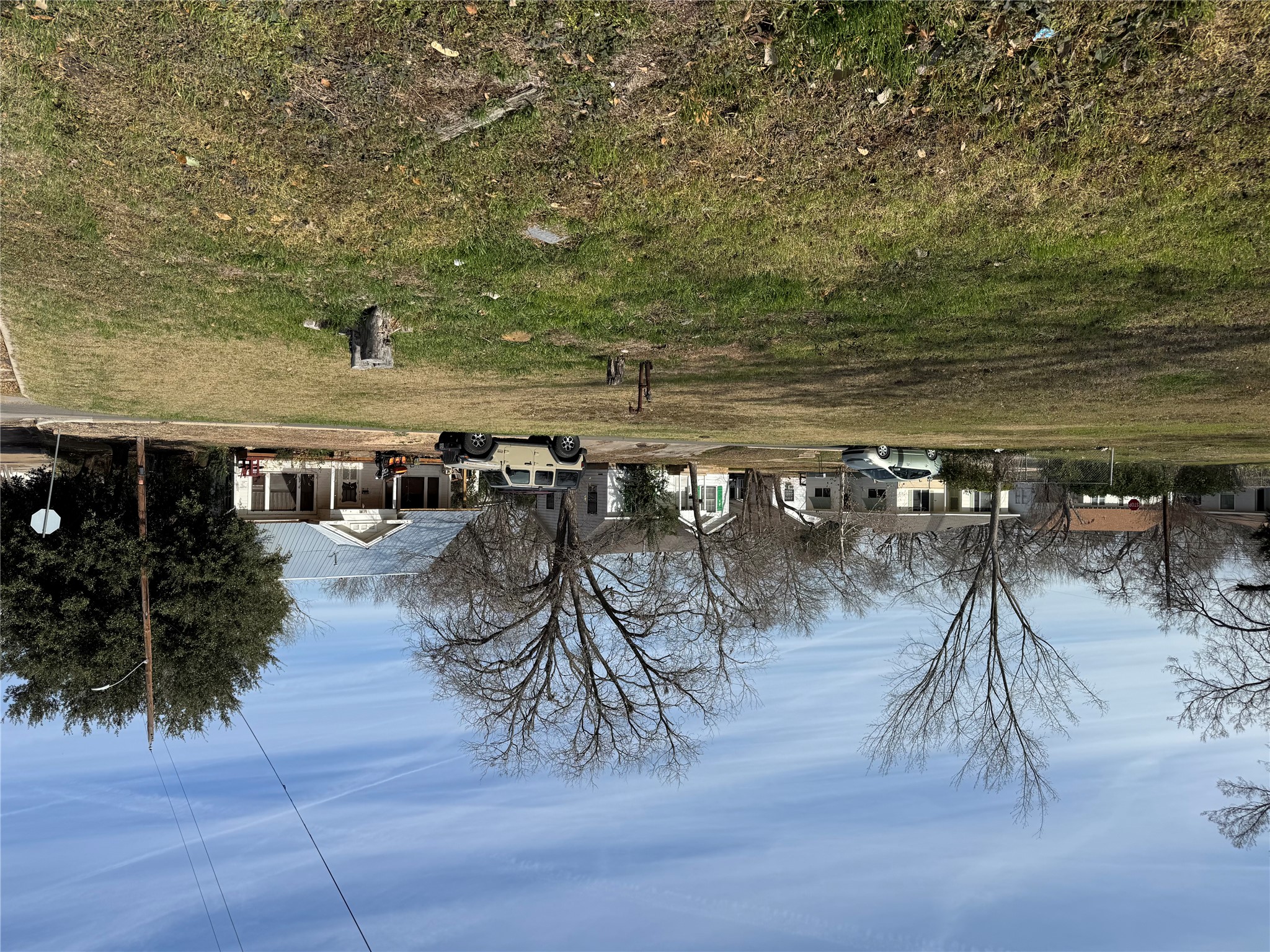 601 West 11th Street Taylor, TX 76574 - Photo 4 of 6 View of yard featuring a residential view and covered porch