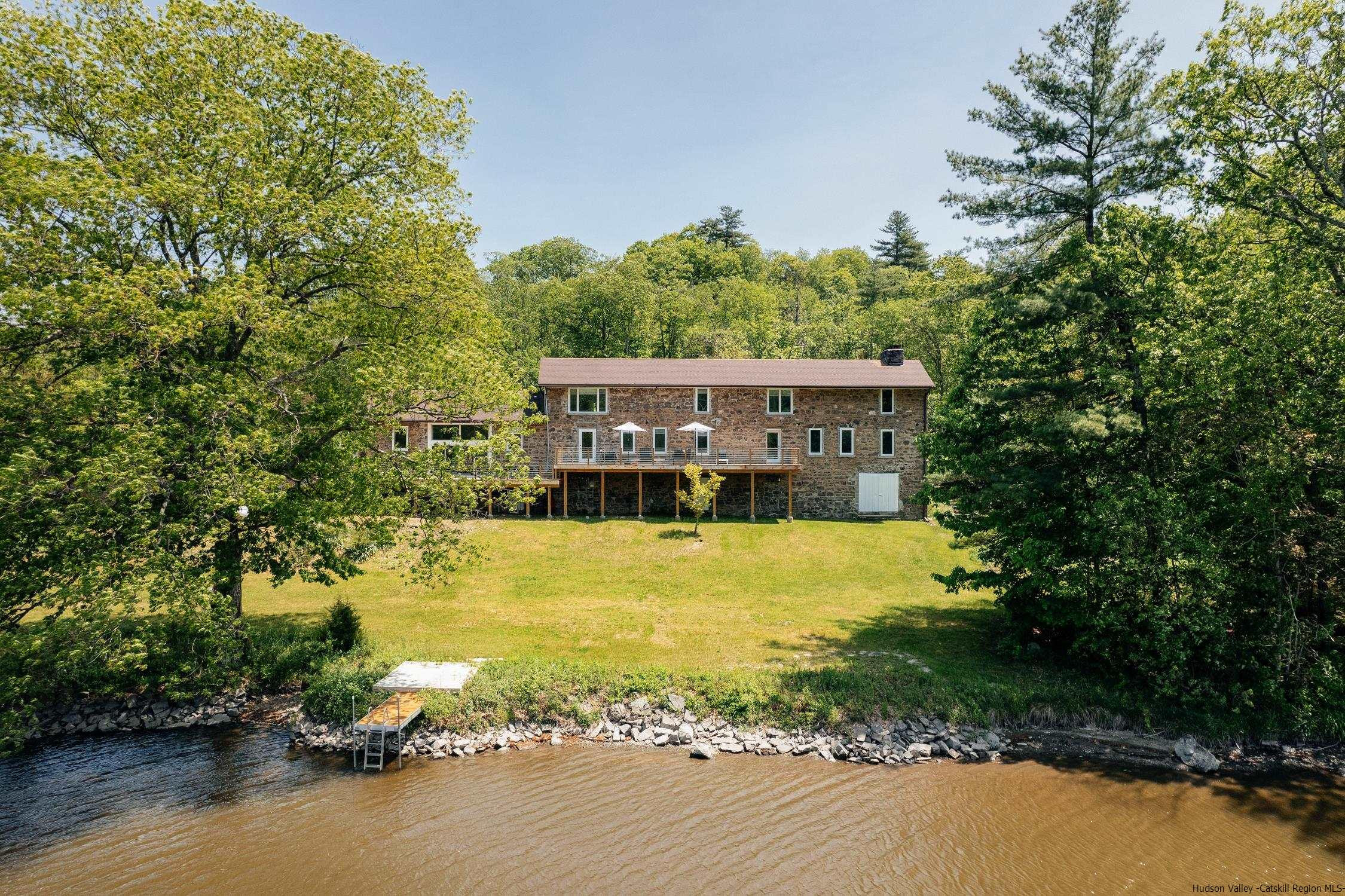 a view of a house with a swimming pool