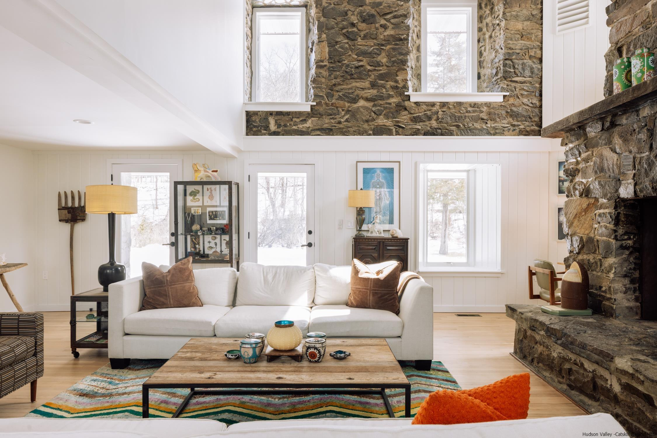 1849 Main Street Rifton, NY 12471 - Photo 7 of 30 a living room with furniture wooden floor and a fireplace