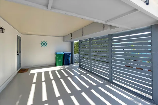 a view of a backyard with swimming pool