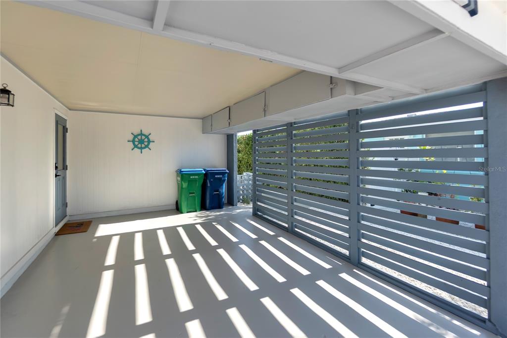 407 63rd Street Holmes Beach, FL 34217 - Photo 26 of 33 a view of empty room with wooden floor