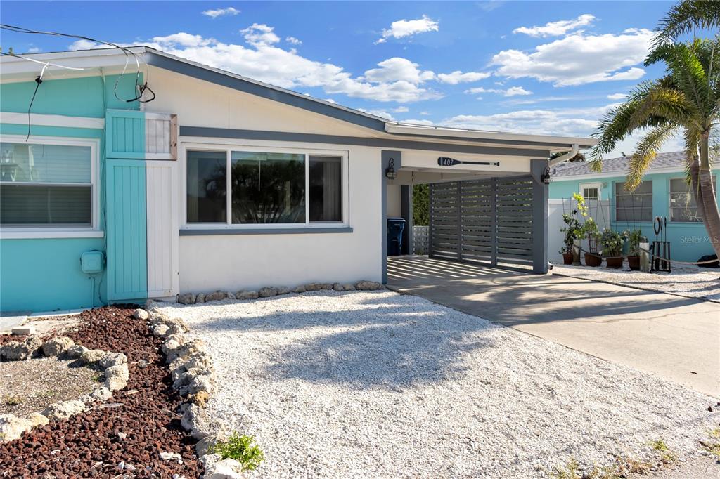 407 63rd Street Holmes Beach, FL 34217 - Photo 3 of 33 a front view of a house