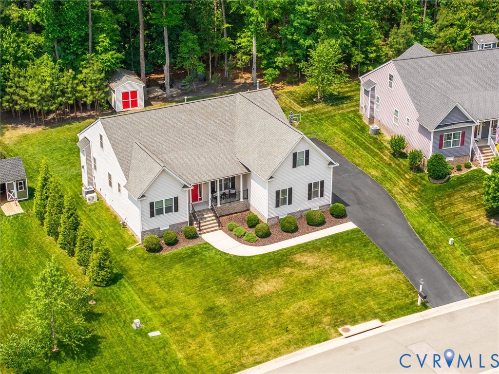 10824 Avening Road Chesterfield, VA 23832 - Photo 47 of 47 an aerial view of a house with swimming pool and large trees