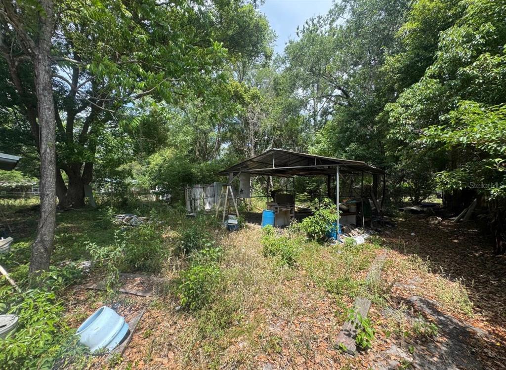 8321 Old Plank Road Jacksonville, FL 32220 - Photo 7 of 8 a view of backyard with green space