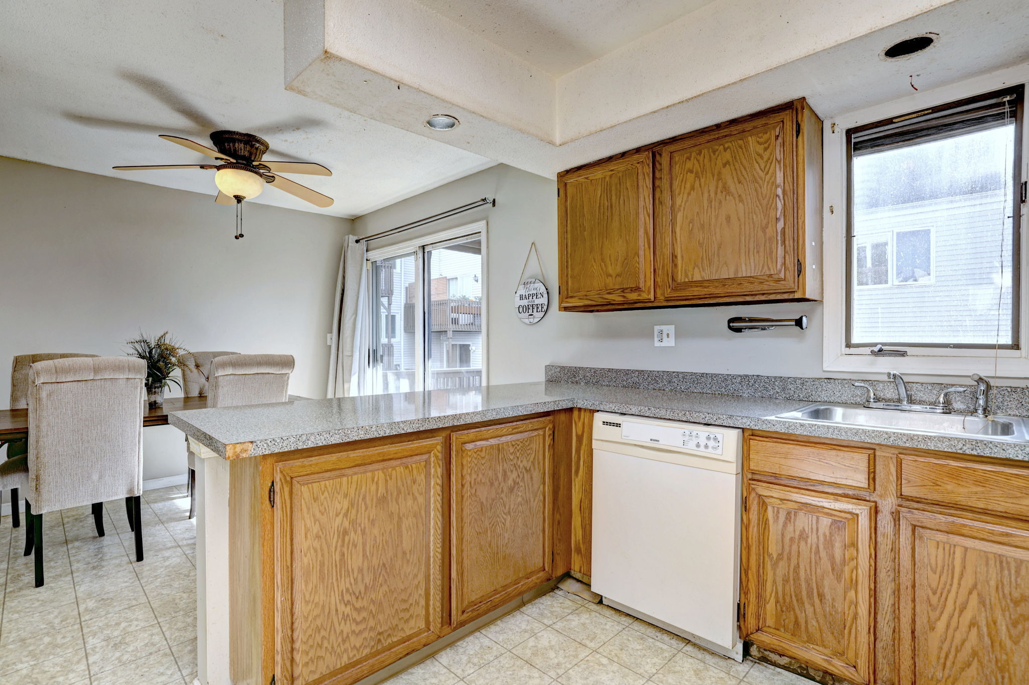 1480 Capitol Avenue, Unit H811 Bridgeport, CT 06604 - Photo 16 of 39 a kitchen with a sink cabinets and window