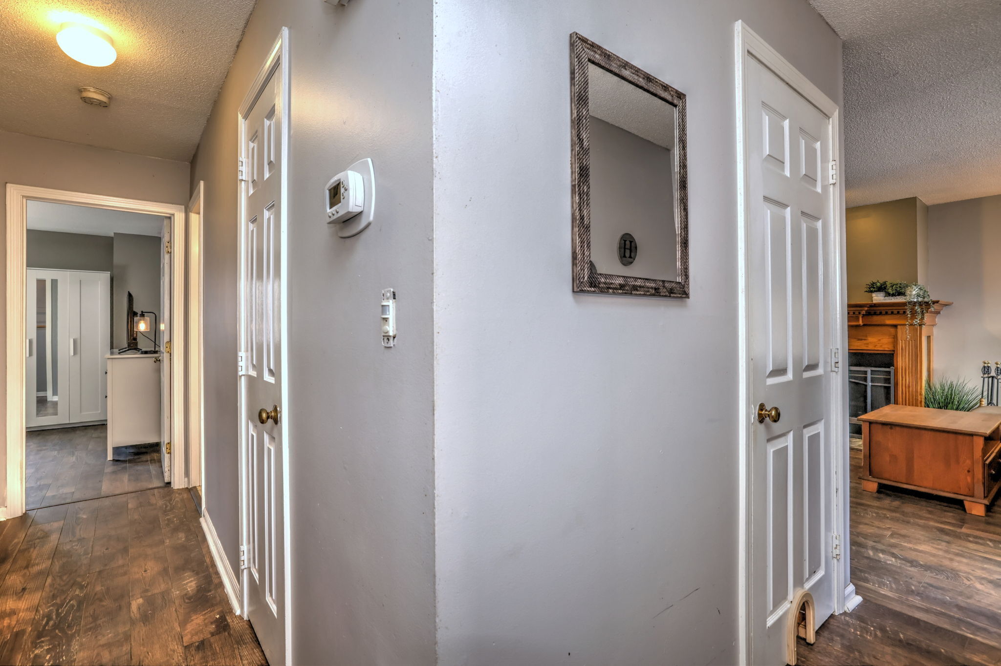 1480 Capitol Avenue, Unit H811 Bridgeport, CT 06604 - Photo 22 of 39 a view of a bedroom from a hallway