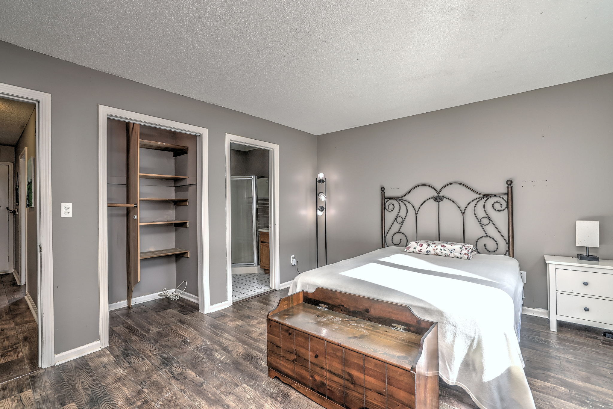 1480 Capitol Avenue, Unit H811 Bridgeport, CT 06604 - Photo 24 of 39 a bedroom with a bed and a cabinets