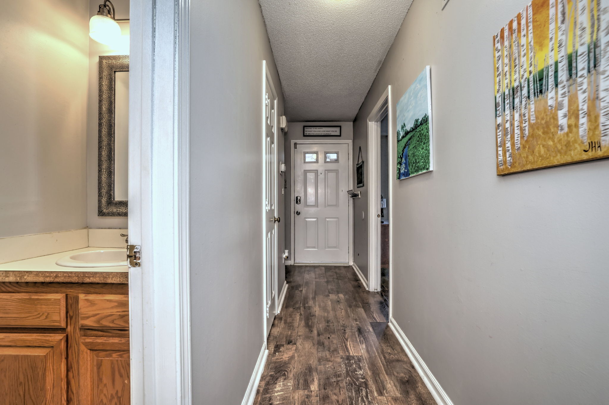 1480 Capitol Avenue, Unit H811 Bridgeport, CT 06604 - Photo 27 of 39 a view of a hallway with wooden floor and staircase