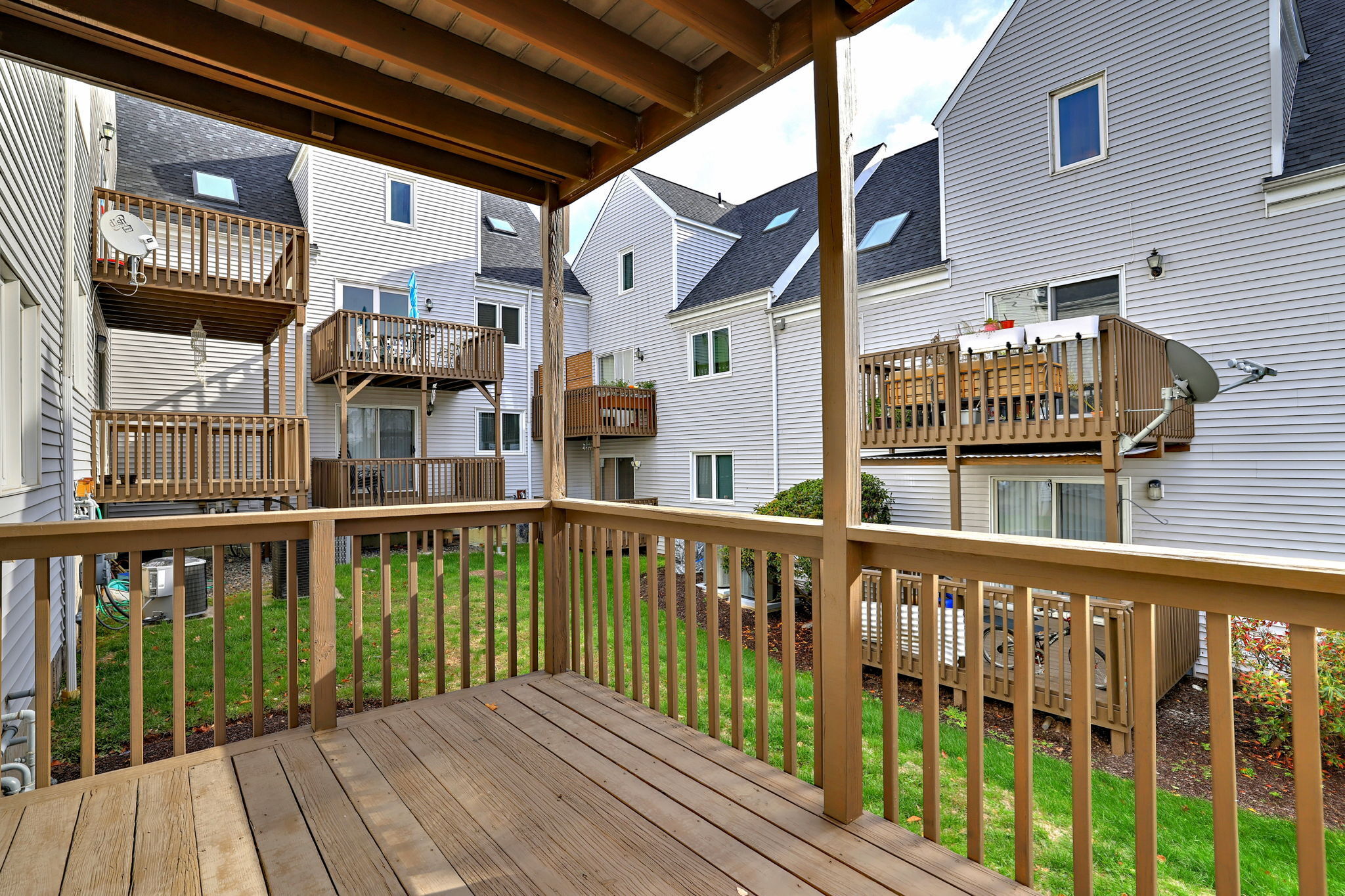 1480 Capitol Avenue, Unit H811 Bridgeport, CT 06604 - Photo 36 of 39 a view of a houses with a small deck