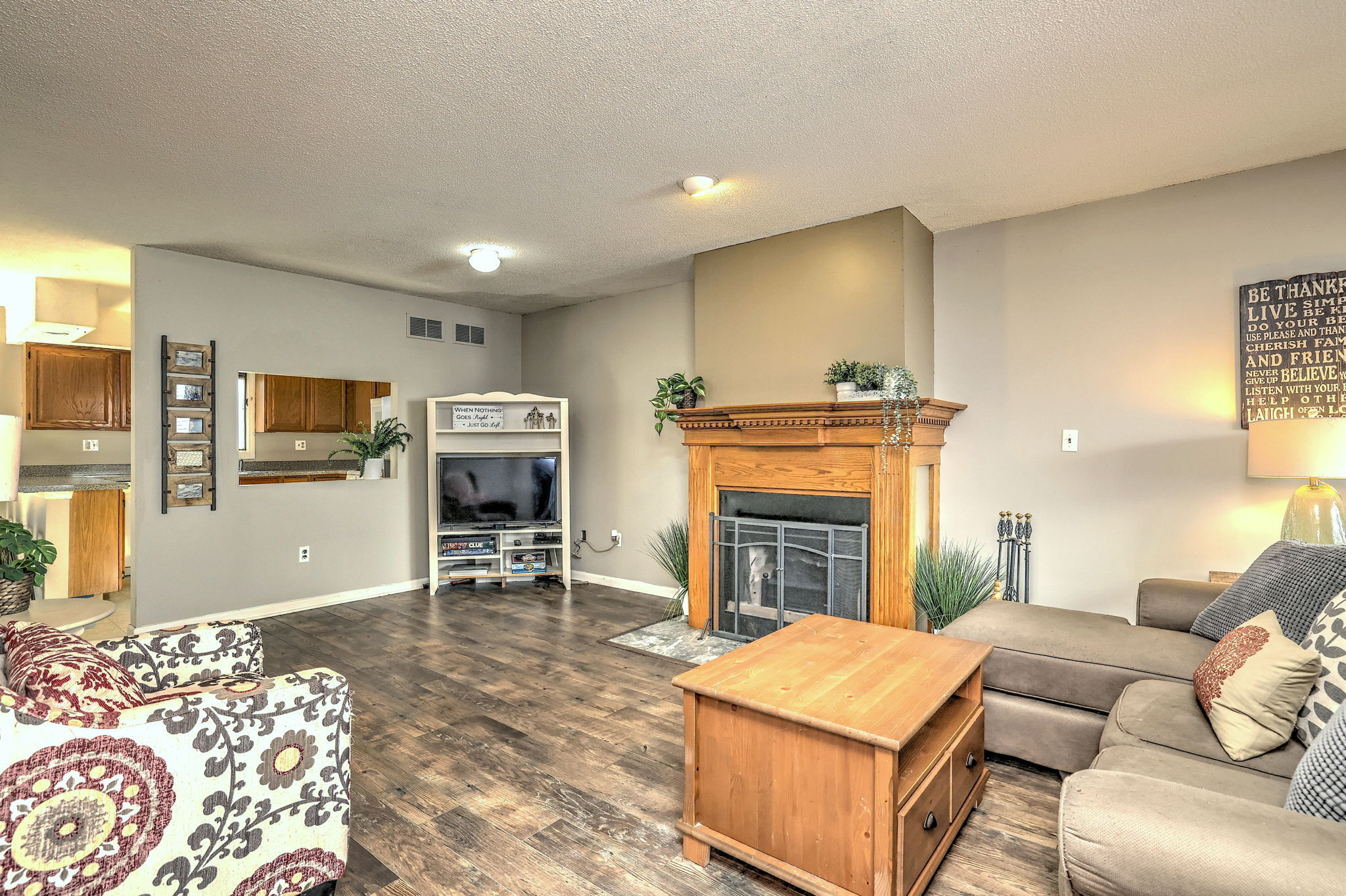 1480 Capitol Avenue, Unit H811 Bridgeport, CT 06604 - Photo 4 of 39 a living room with furniture and a fireplace