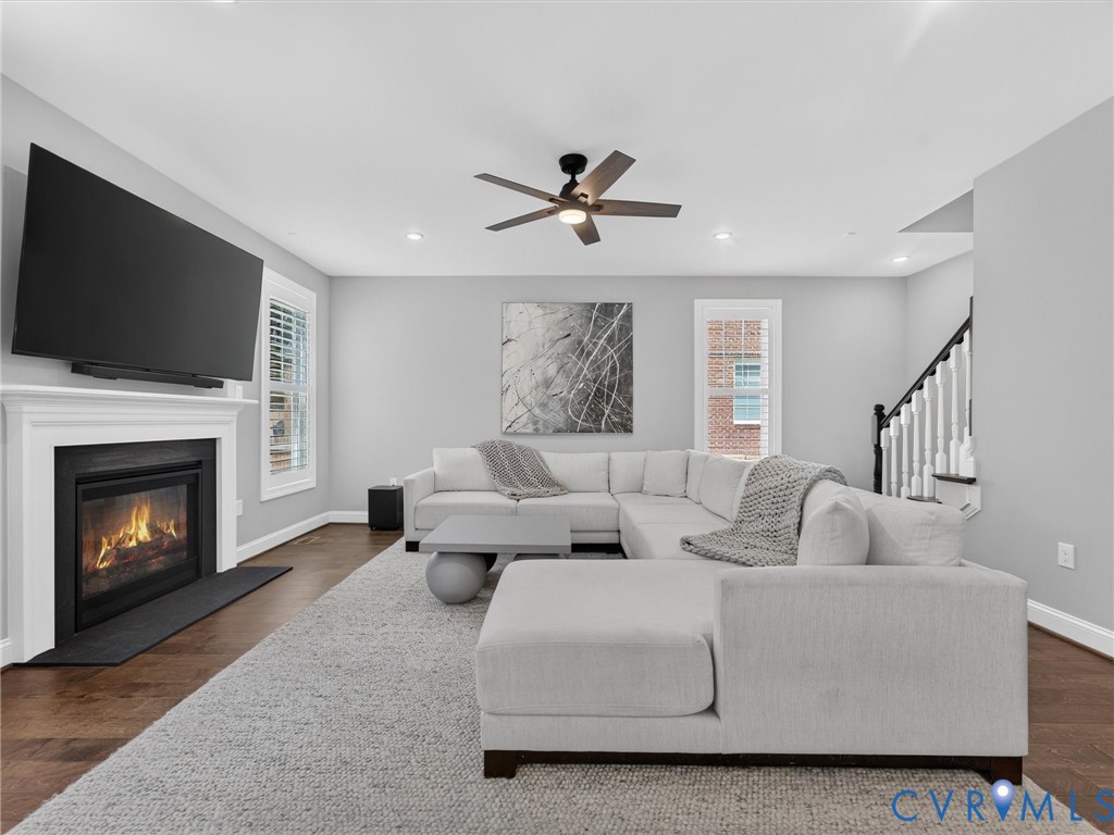 9011 Midway Road Henrico, VA 23229 - Photo 28 of 65 Living area featuring hardwood flooring, a firepla