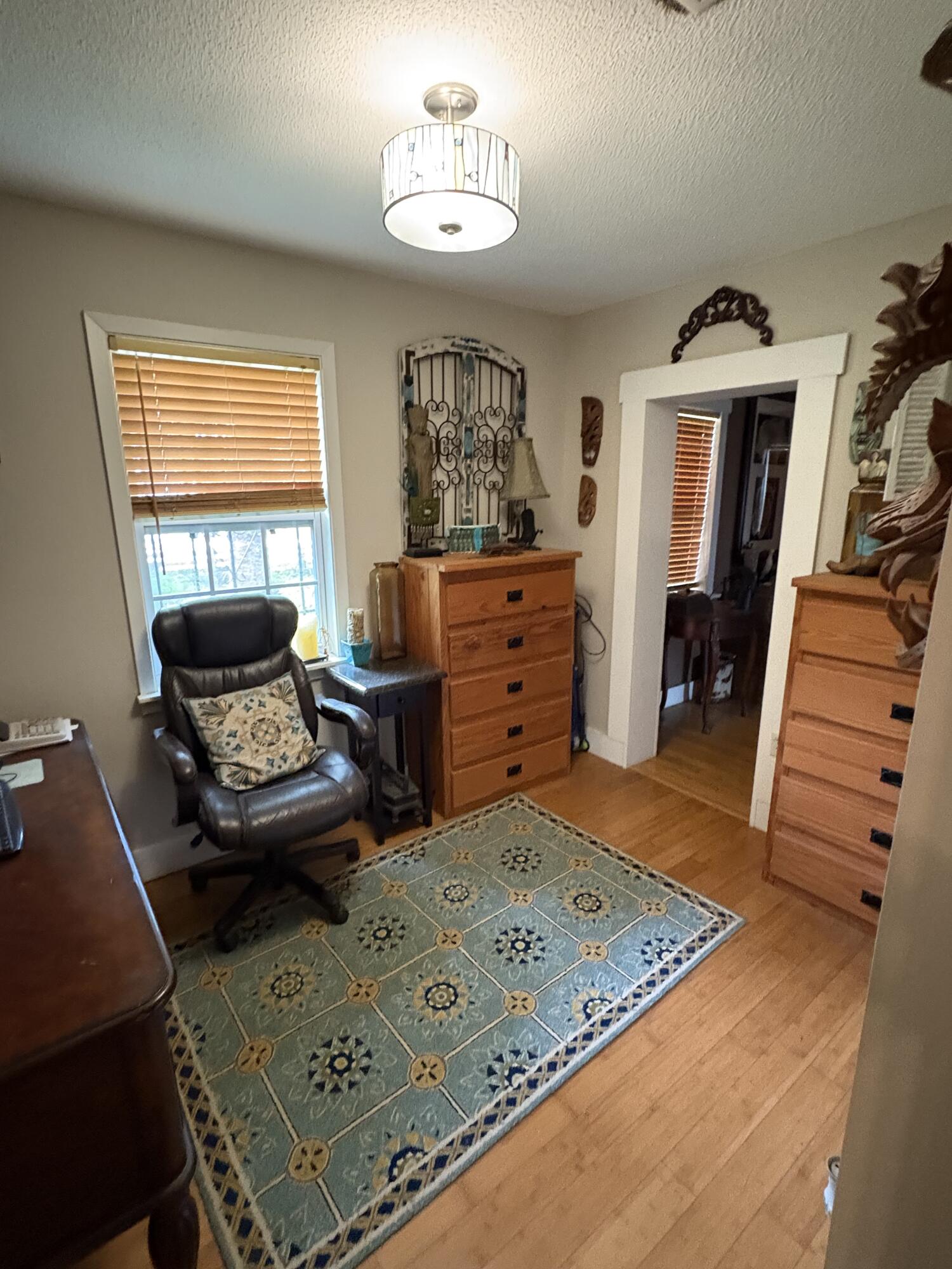 335 Acacia Street Santa Rosa Beach, FL 32459 - Photo 11 of 36 a living room with furniture and a window