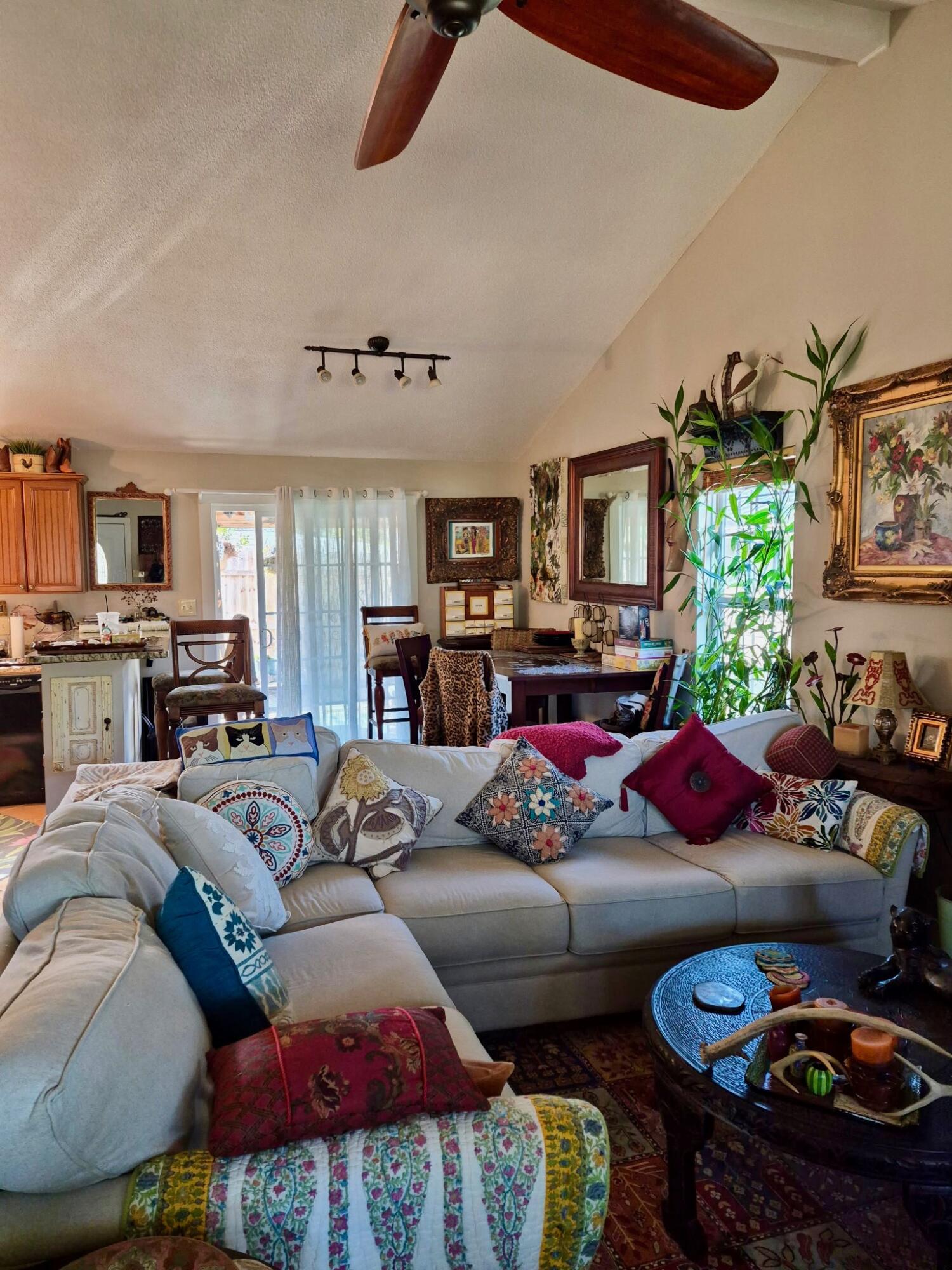 335 Acacia Street Santa Rosa Beach, FL 32459 - Photo 12 of 36 a living room with furniture fireplace and a window