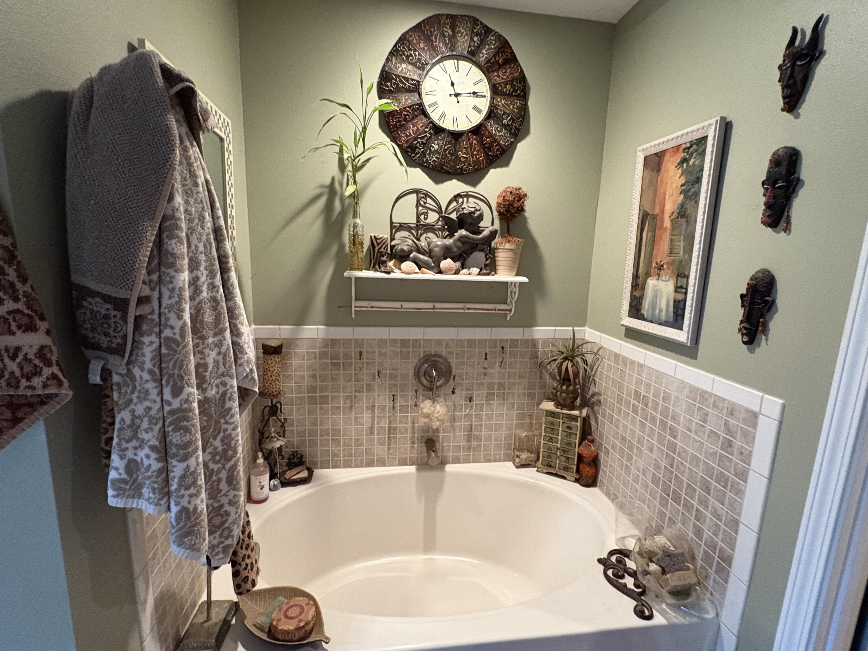 335 Acacia Street Santa Rosa Beach, FL 32459 - Photo 15 of 36 a bathroom with a sink and a large mirror