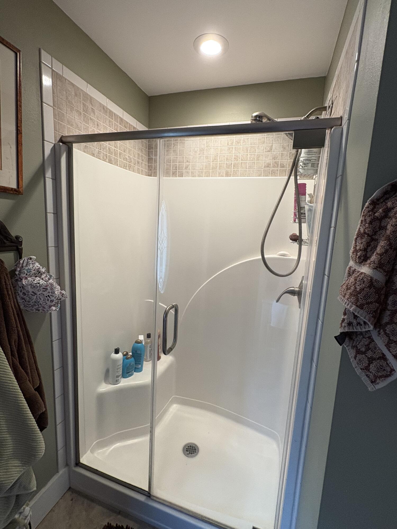 335 Acacia Street Santa Rosa Beach, FL 32459 - Photo 16 of 36 a bathroom with a shower and a mirror