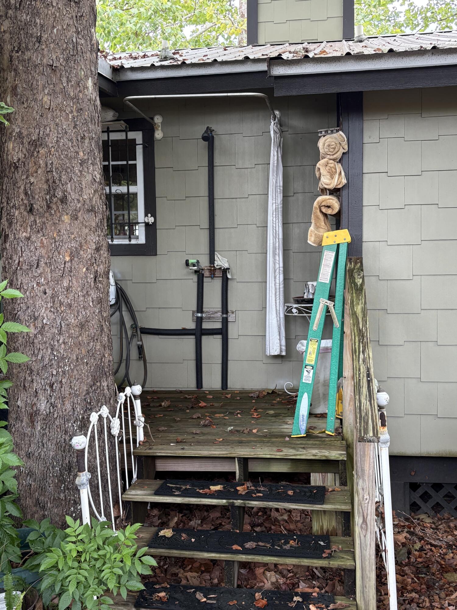 335 Acacia Street Santa Rosa Beach, FL 32459 - Photo 17 of 36 a front view of a house with garden
