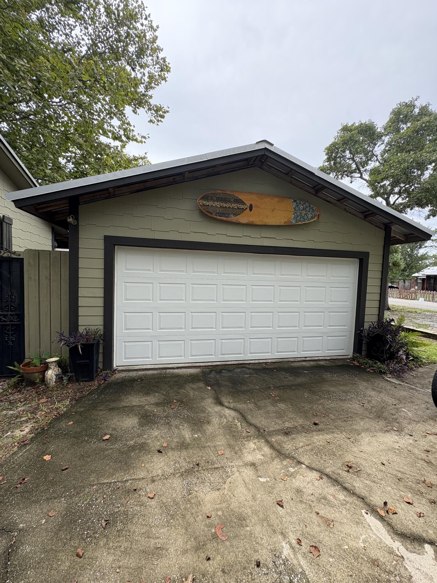 335 Acacia Street Santa Rosa Beach, FL 32459 - Photo 28 of 36 a view of a house with a garage