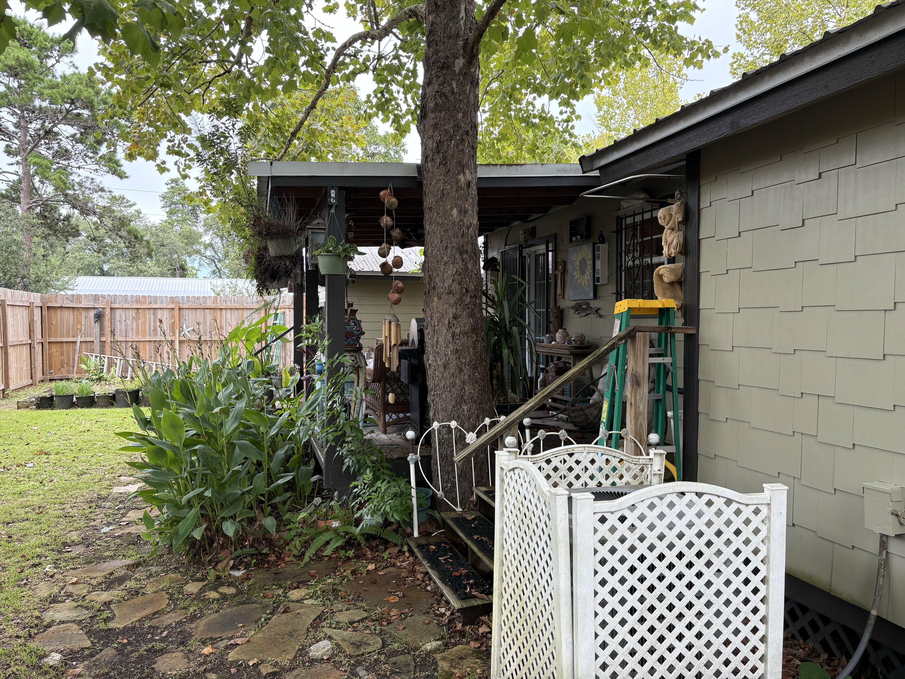 335 Acacia Street Santa Rosa Beach, FL 32459 - Photo 31 of 36 a front view of a house having yard