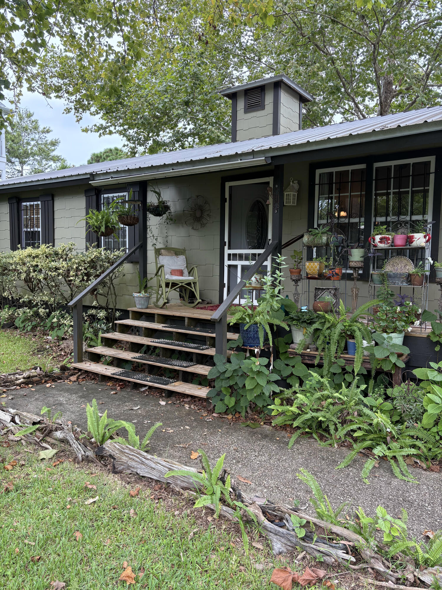 335 Acacia Street Santa Rosa Beach, FL 32459 - Photo 4 of 36 a front view of house with deck and yard