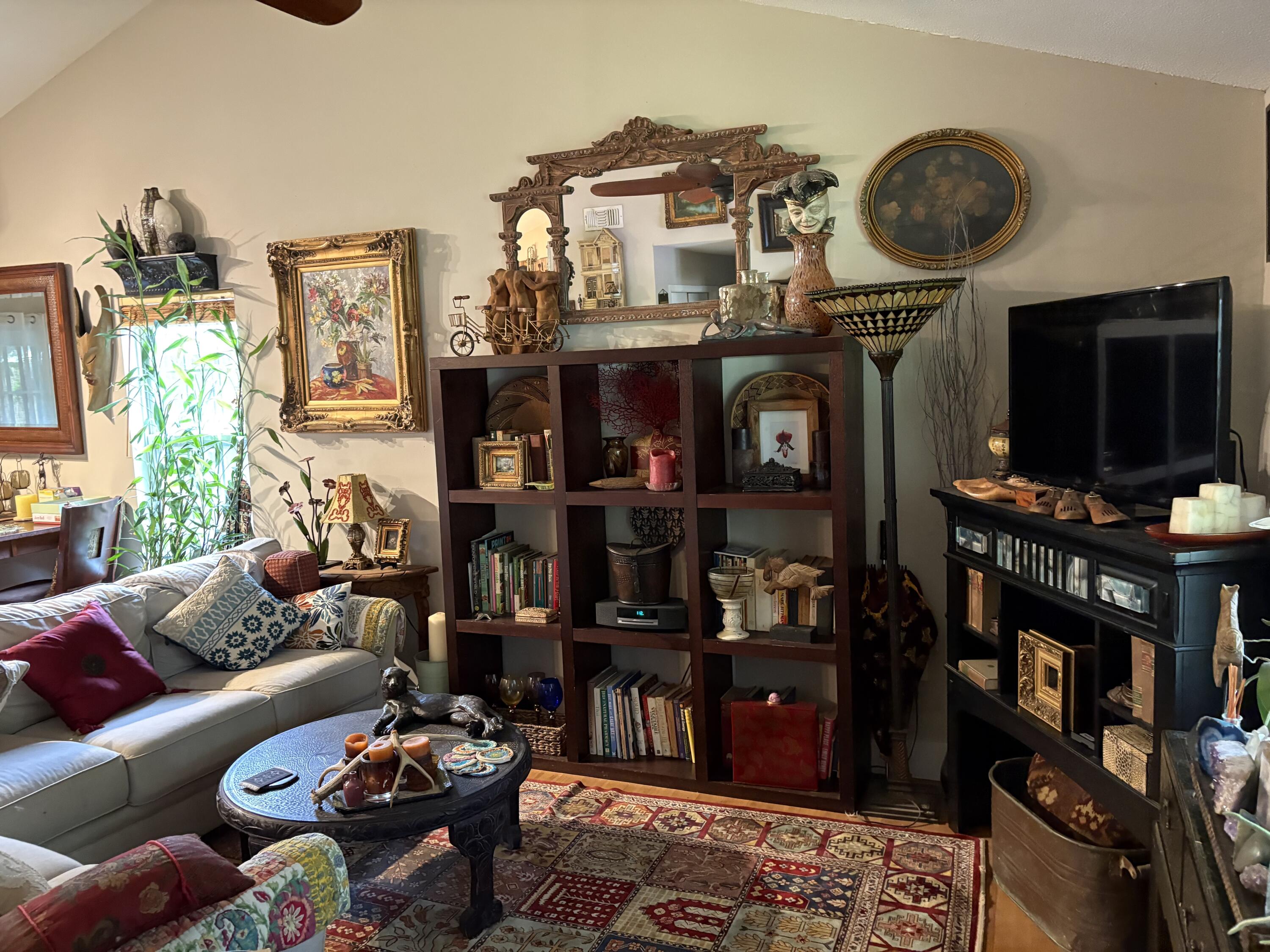 335 Acacia Street Santa Rosa Beach, FL 32459 - Photo 5 of 36 a living room with lots of furniture and a flat screen tv