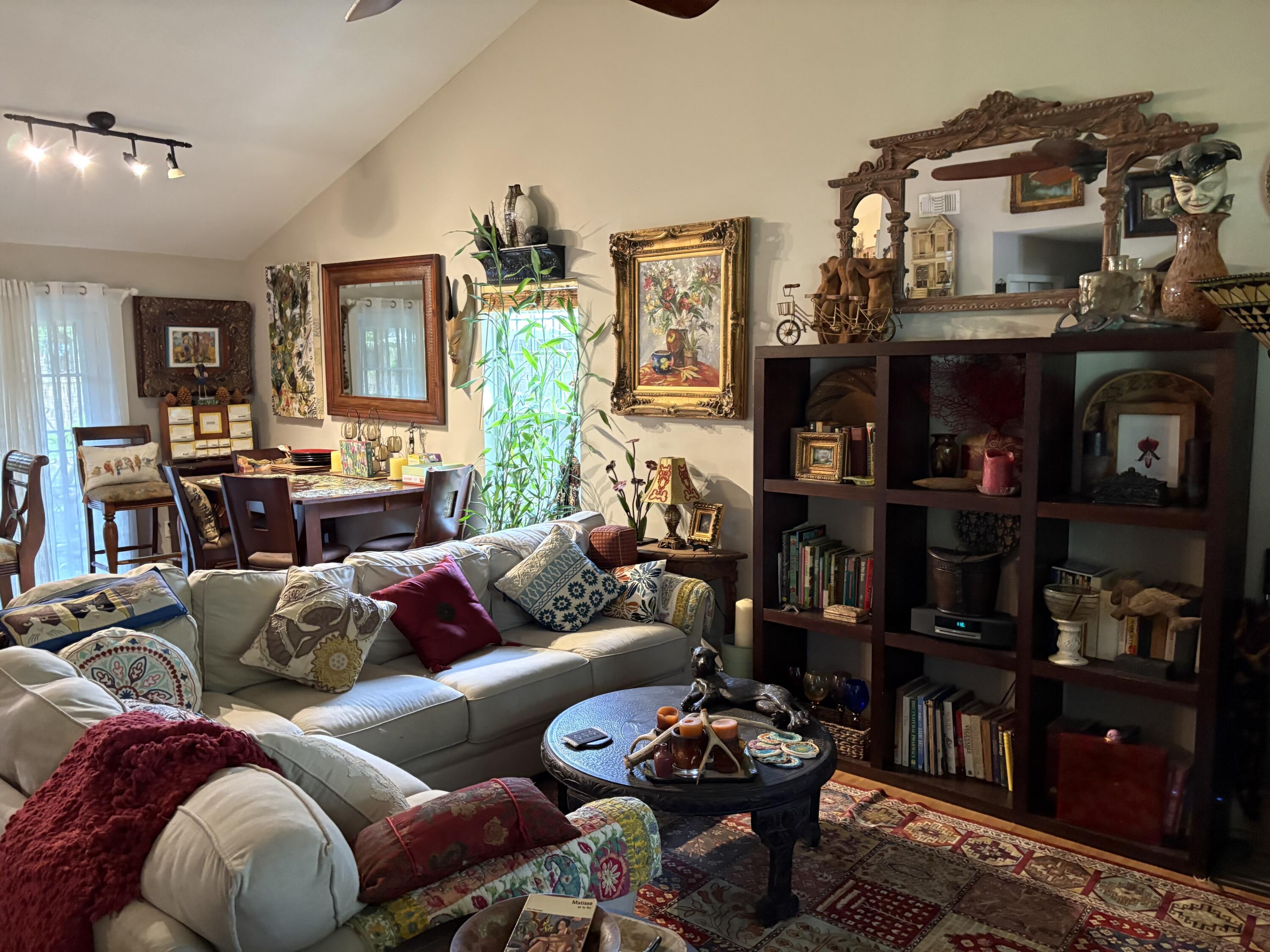 335 Acacia Street Santa Rosa Beach, FL 32459 - Photo 6 of 36 a living room with furniture and wooden floor