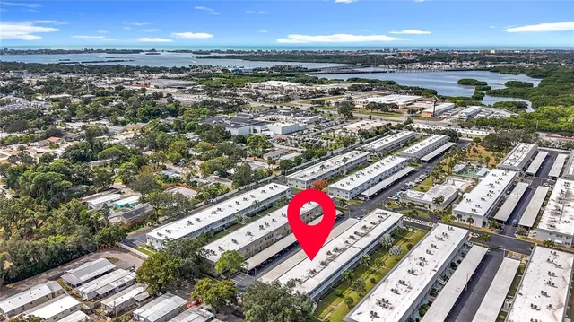 a view of a house with a window and wooden floor