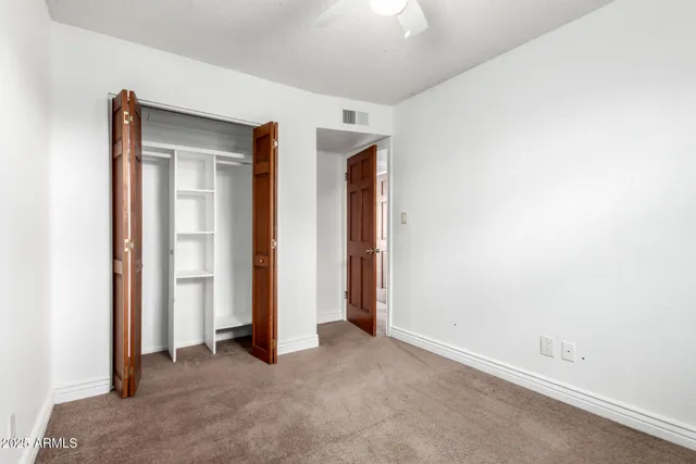 an empty room with closet