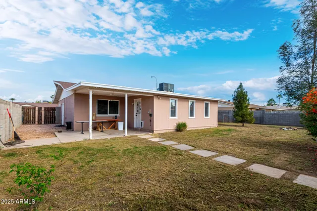 a front view of a house with patio