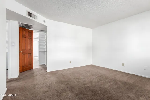 an empty room with window