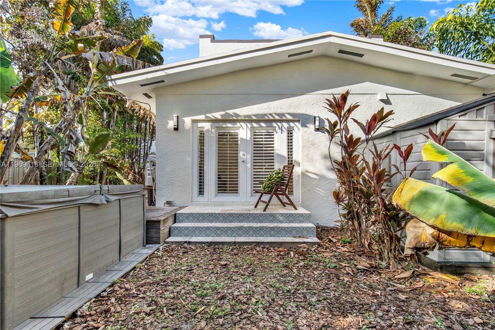 2006 Southwest 12th Street Miami, FL 33135 - Photo 48 of 61 Spa is adjacent to the back entrance to Primary Bedroom