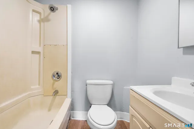 a view of an empty walk in closet