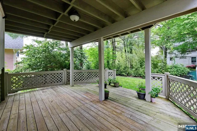 a view of a deck with wooden floor and wooden floor