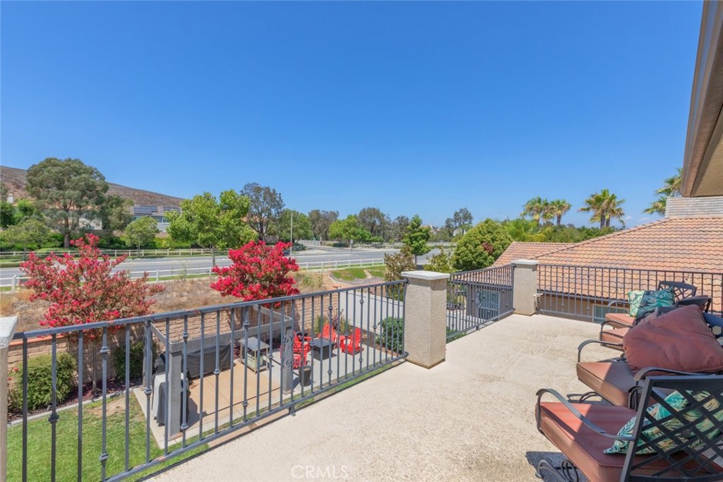 31134 Maverick Lane Temecula, CA 92591 - Photo 16 of 22 a view of a chairs and table in the balcony