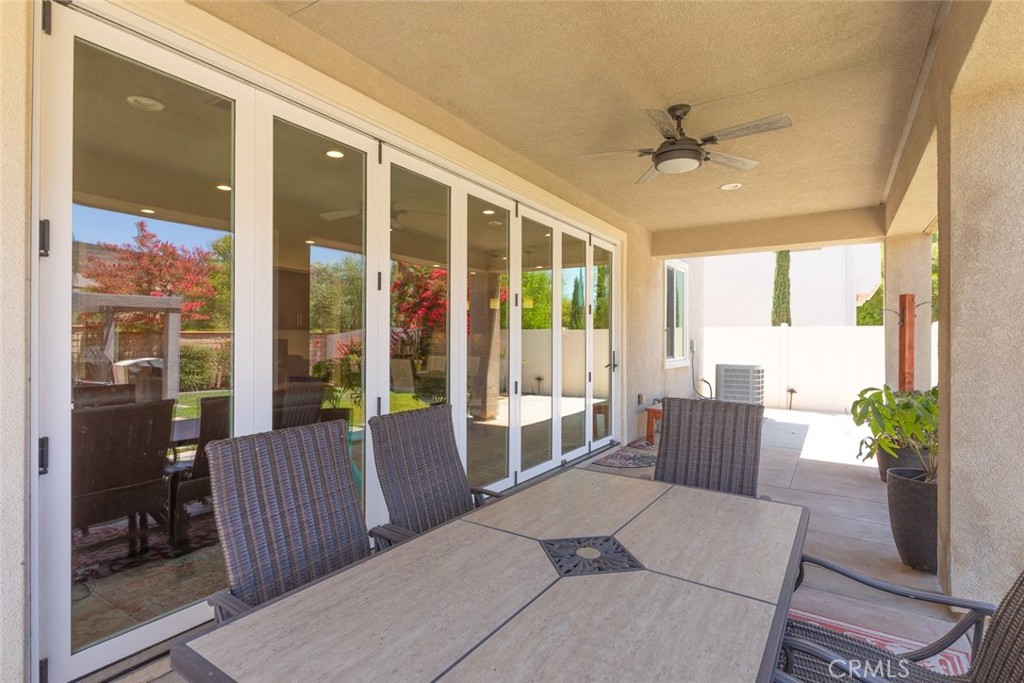 31134 Maverick Lane Temecula, CA 92591 - Photo 21 of 24 a living room with furniture and windows