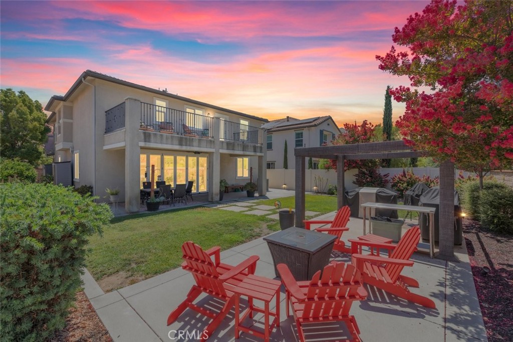 31134 Maverick Lane Temecula, CA 92591 - Photo 3 of 24 a view of a patio with table and chairs and potted plants
