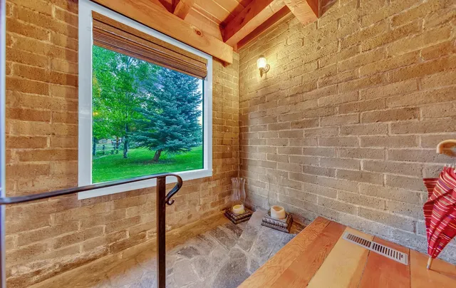 a view of a patio with a yard