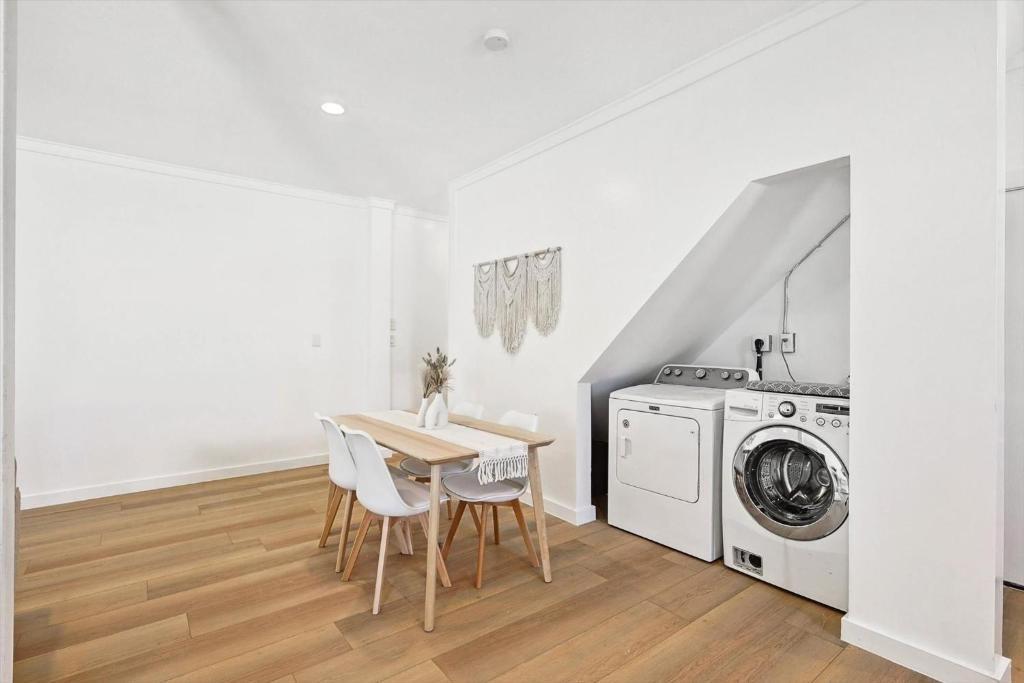 3322 Darby Lane, Unit GUEST Denton, TX 76207 - Photo 12 of 22 a view of a kitchen with a stove top oven and cabinets