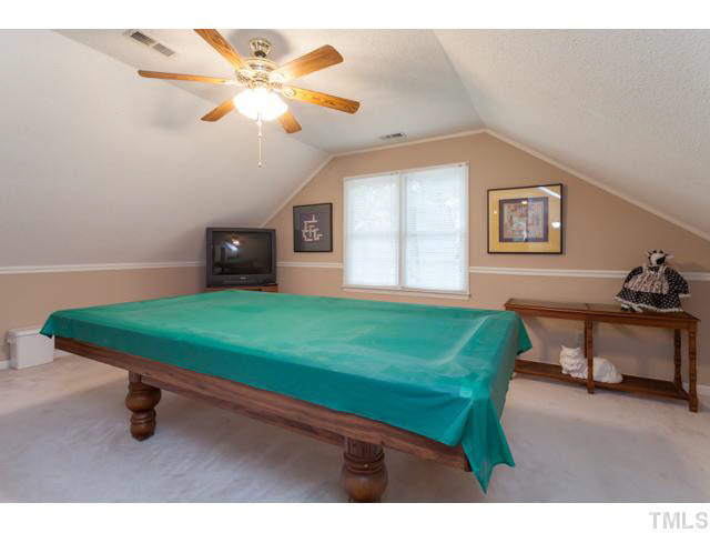 5129 Fairmead Circle Raleigh, NC 27613 - Photo 21 of 25 a room with pool table and windows