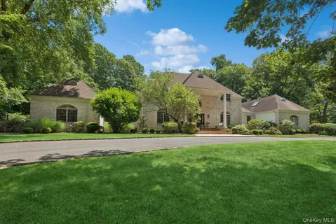 an aerial view of a house with a garden