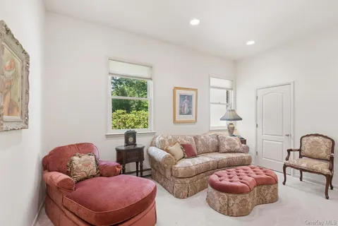 a kitchen with stainless steel appliances kitchen island granite countertop a sink and cabinets