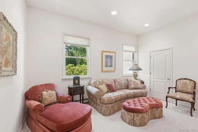 a kitchen with stainless steel appliances kitchen island granite countertop a sink and cabinets